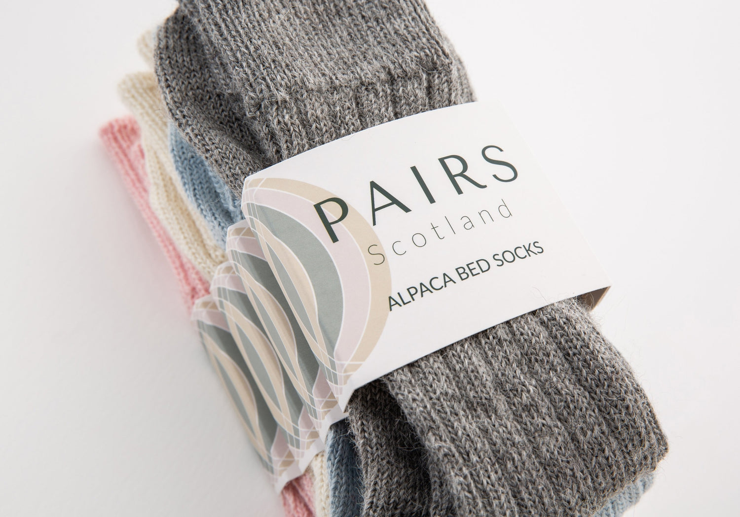 alpaca wool bed soft men and women sock range in soft hues, four pairs piled up