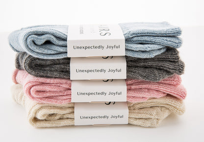 alpaca wool bed soft men and women sock range in soft hues, four pairs piled up