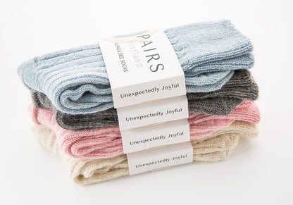 alpaca wool bed soft men and women sock range in soft hues, four pairs piled up