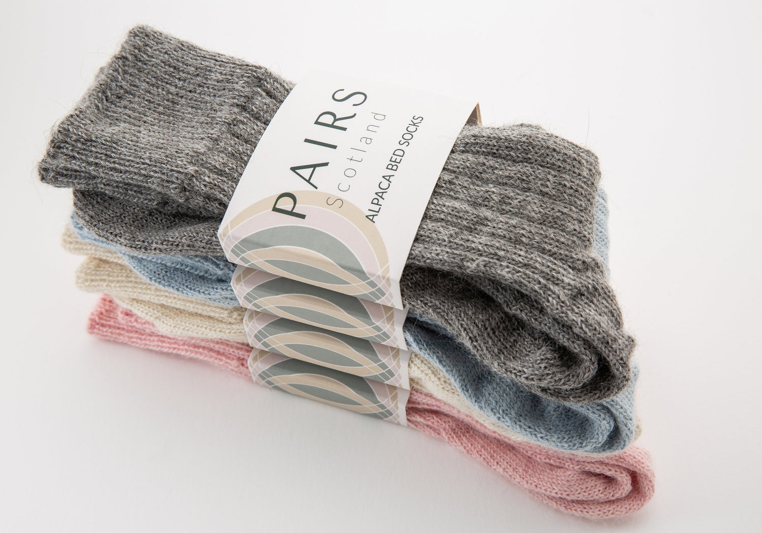 alpaca wool bed soft men and women sock range in soft hues, four pairs piled up