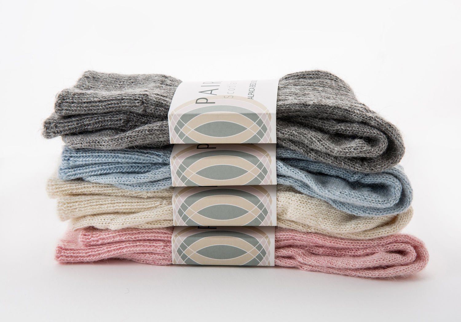 alpaca wool bed soft men and women sock range in soft hues, four pairs piled up