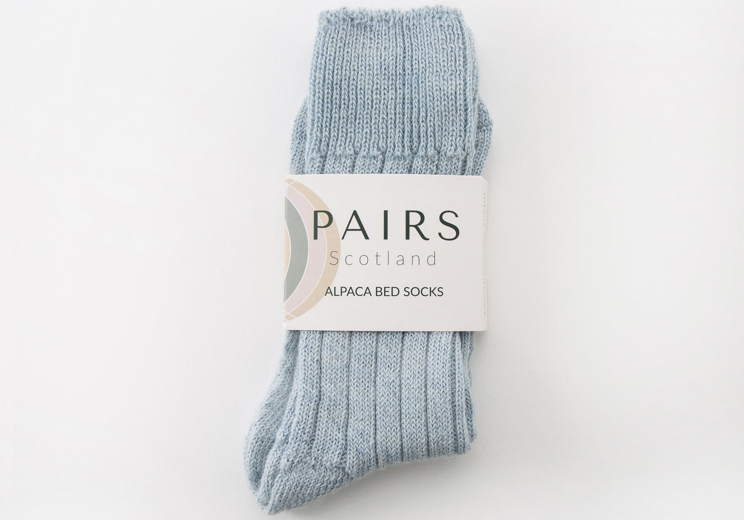 alpaca light blue bed socks in brand packaging