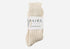 natural undyed cream white alpaca wool socks in brand packaging