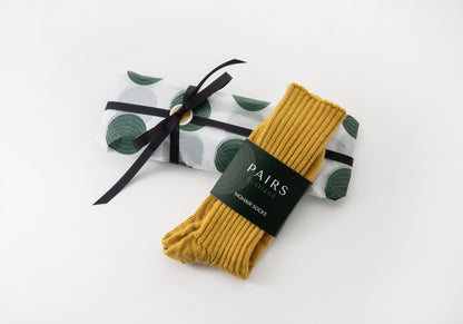 mohair alpaca wool socks gift wrap with yellow mustard pair of socks