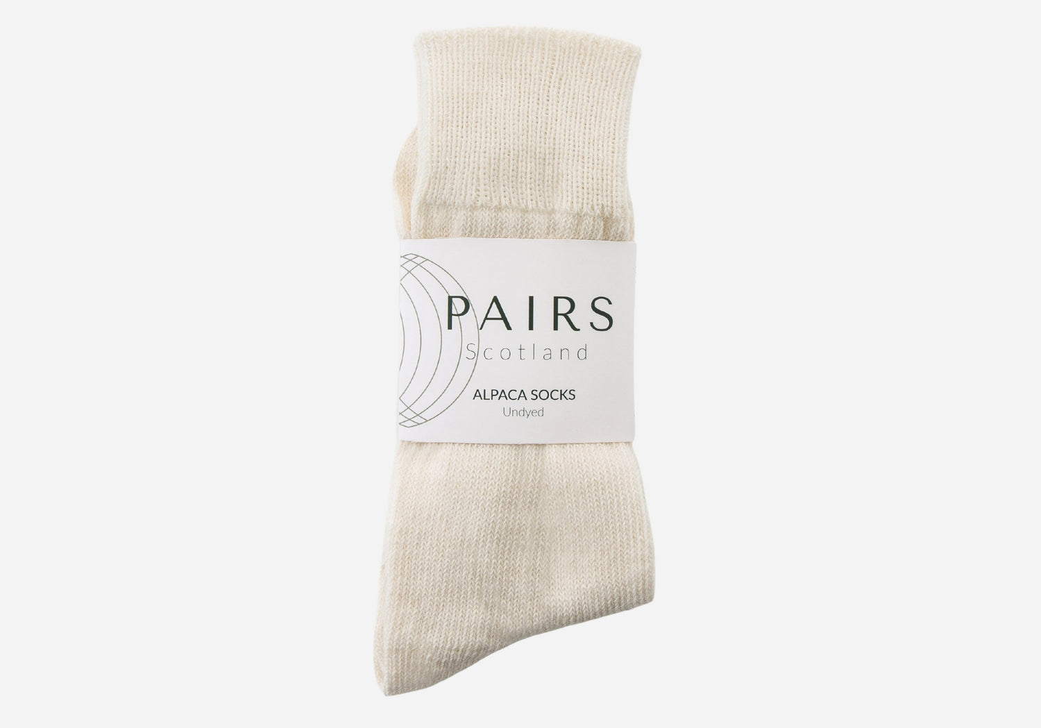 natural undyed cream white alpaca wool socks in brand packaging